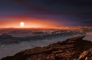 Artist impression showing the surface of the planet Proxima b orbiting the red dwarf star Proxima Centauri, the closest star to the Solar System. Credit: ESO/M. Kornmesser.